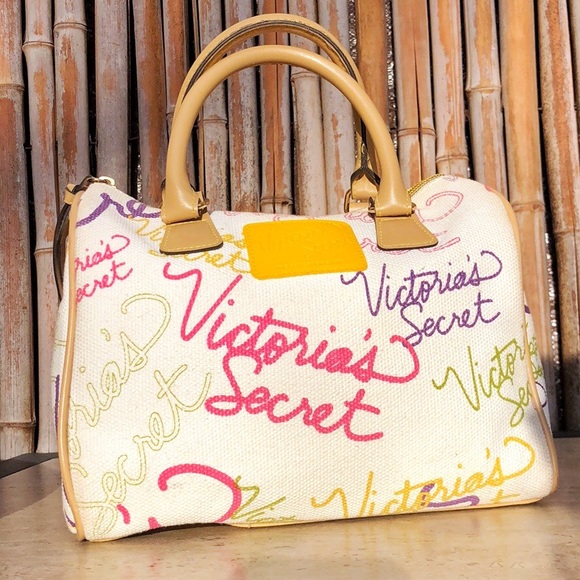 Victoria's Secret Handbags - VICTORIA'S SECRET Ivory Canvas Logo Bag Tan Trim